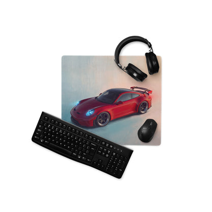 Porsche 911 gt3 rs inspired crimson aerial desk mat low friction gaming mousepad with red sports car design and nearby headphones and keyboard