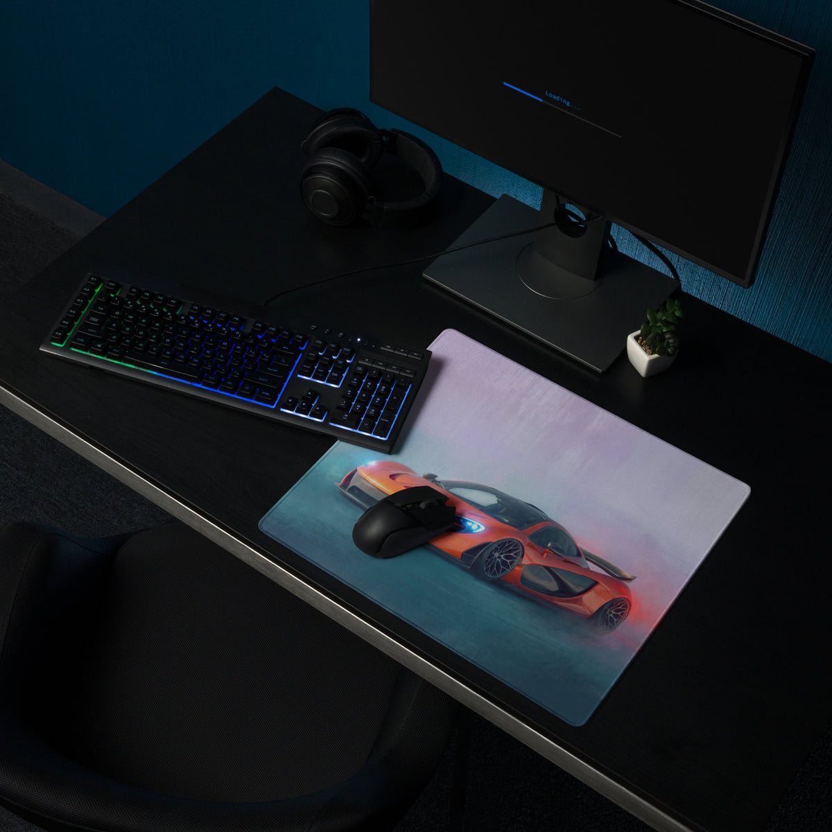 Rectangular non-slip rubber mousepad featuring an orange and black mclaren p1 inspired sports car graphic