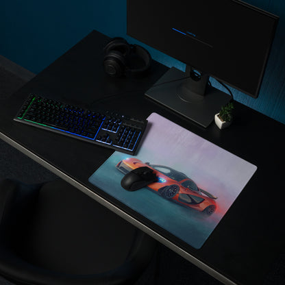 Rectangular non-slip rubber mousepad featuring an orange and black mclaren p1 inspired sports car graphic