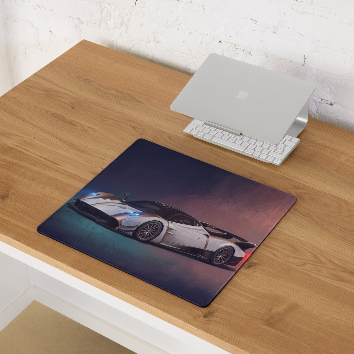 Pagani huayra r inspired gold accent desk pad with high resolution white sports car print and stitched edge mouse mat