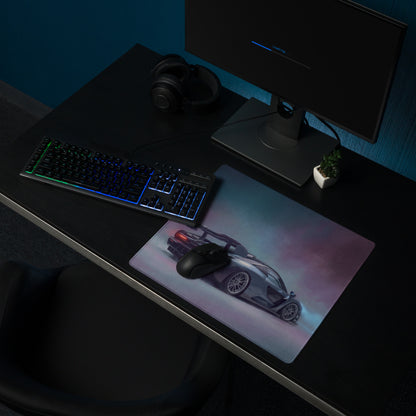 A sleek rectangular ultra-glide xl gaming mouse mat featuring a silver mclaren senna car with glowing red rear accents