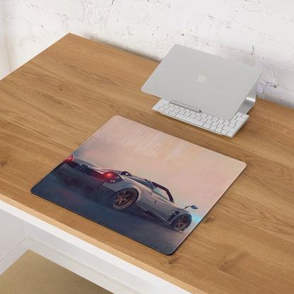 Rectangular non-slip rubber gaming mousepad featuring a detailed silver pagani huayra roadster with red taillights and black wheels