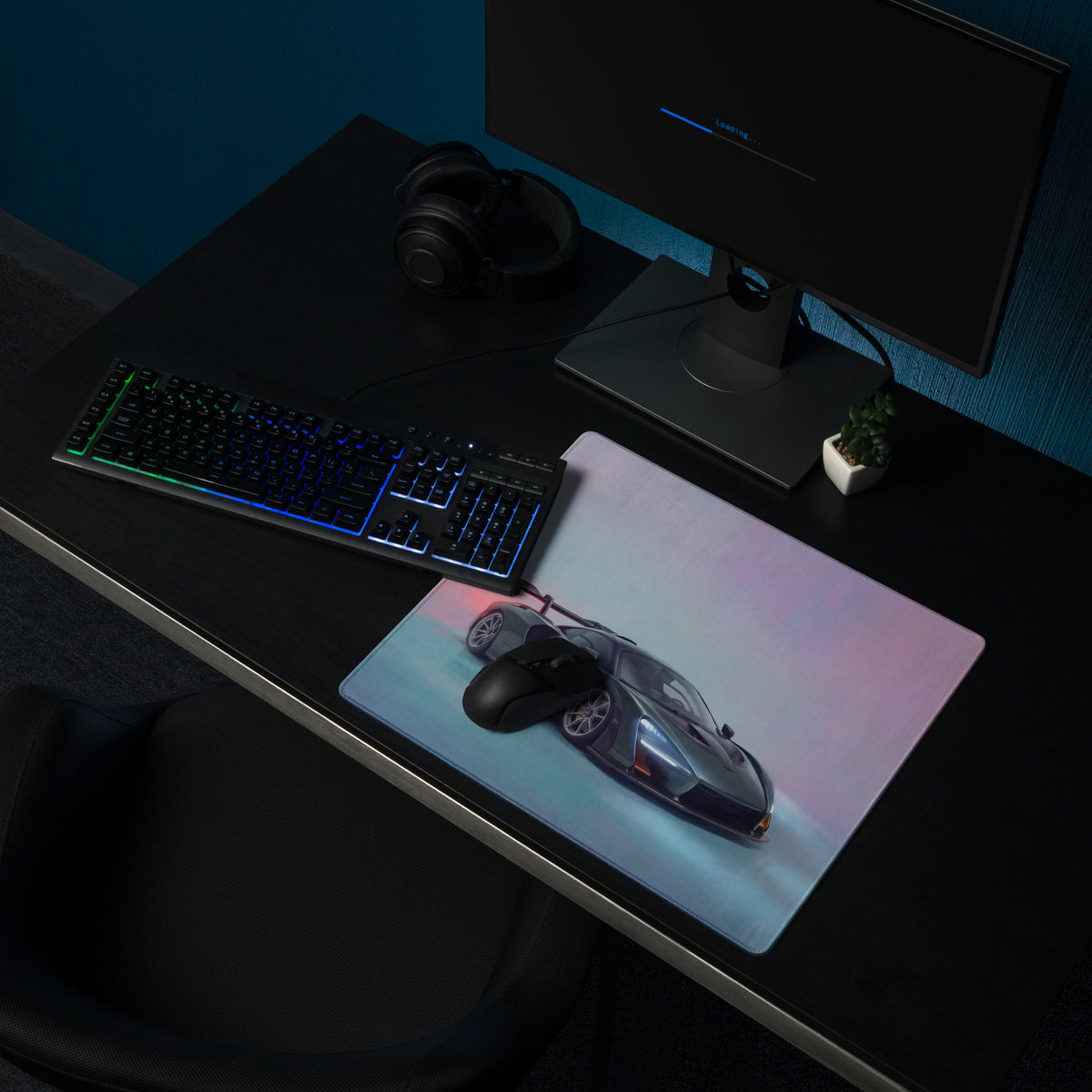 A sleek rectangular mclaren senna inspired racing green desk pad with glossy dark gray sports car print and stitched edges