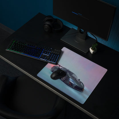 A sleek rectangular mclaren senna inspired racing green desk pad with glossy dark gray sports car print and stitched edges