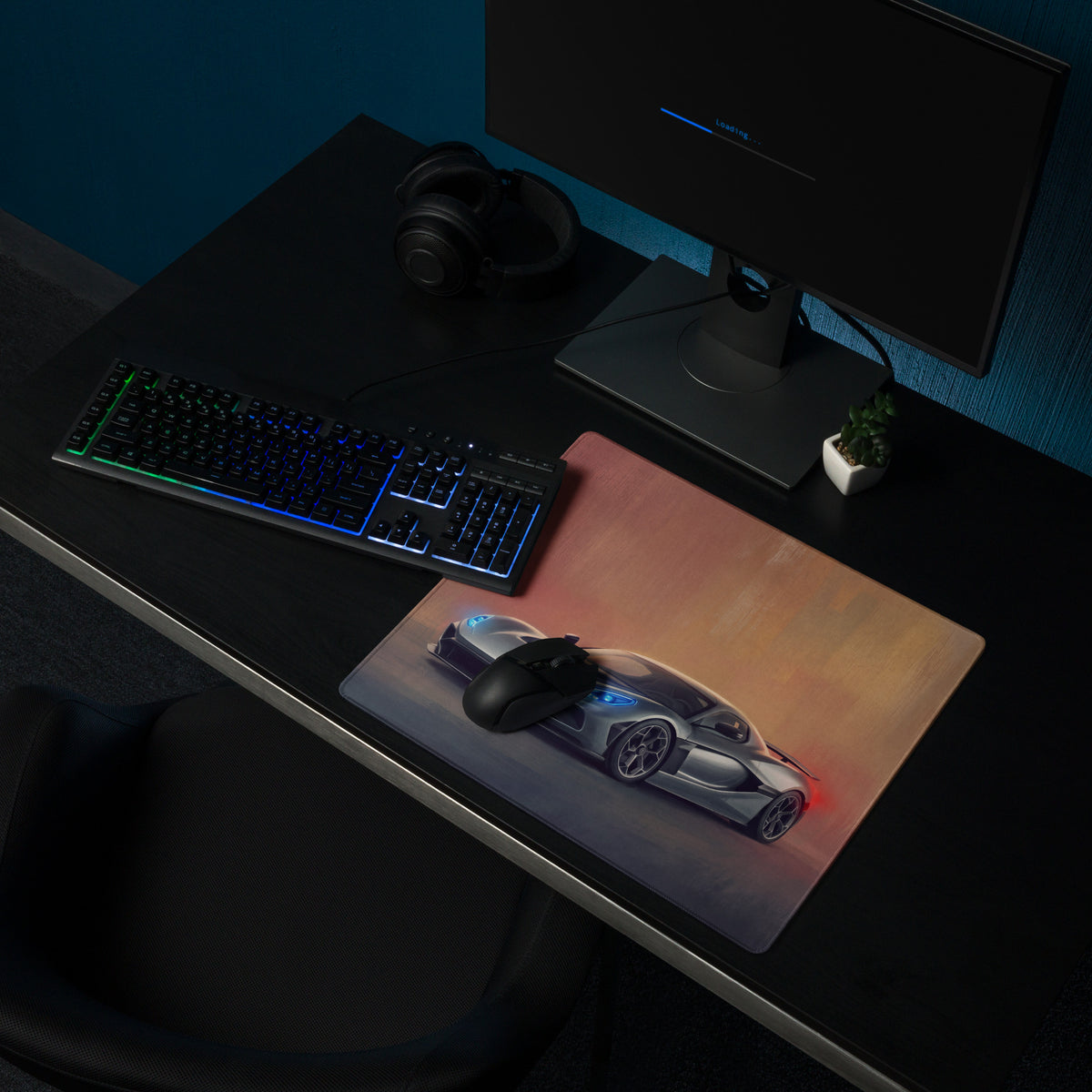 A sleek rectangular rimac nevera inspired electric silver desk pad with ultra-glide stitched edge and sports car graphic