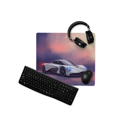 Aston Martin Valhalla inspired silver aero desk mat with white sports car graphic on purple and pink sky mousepad