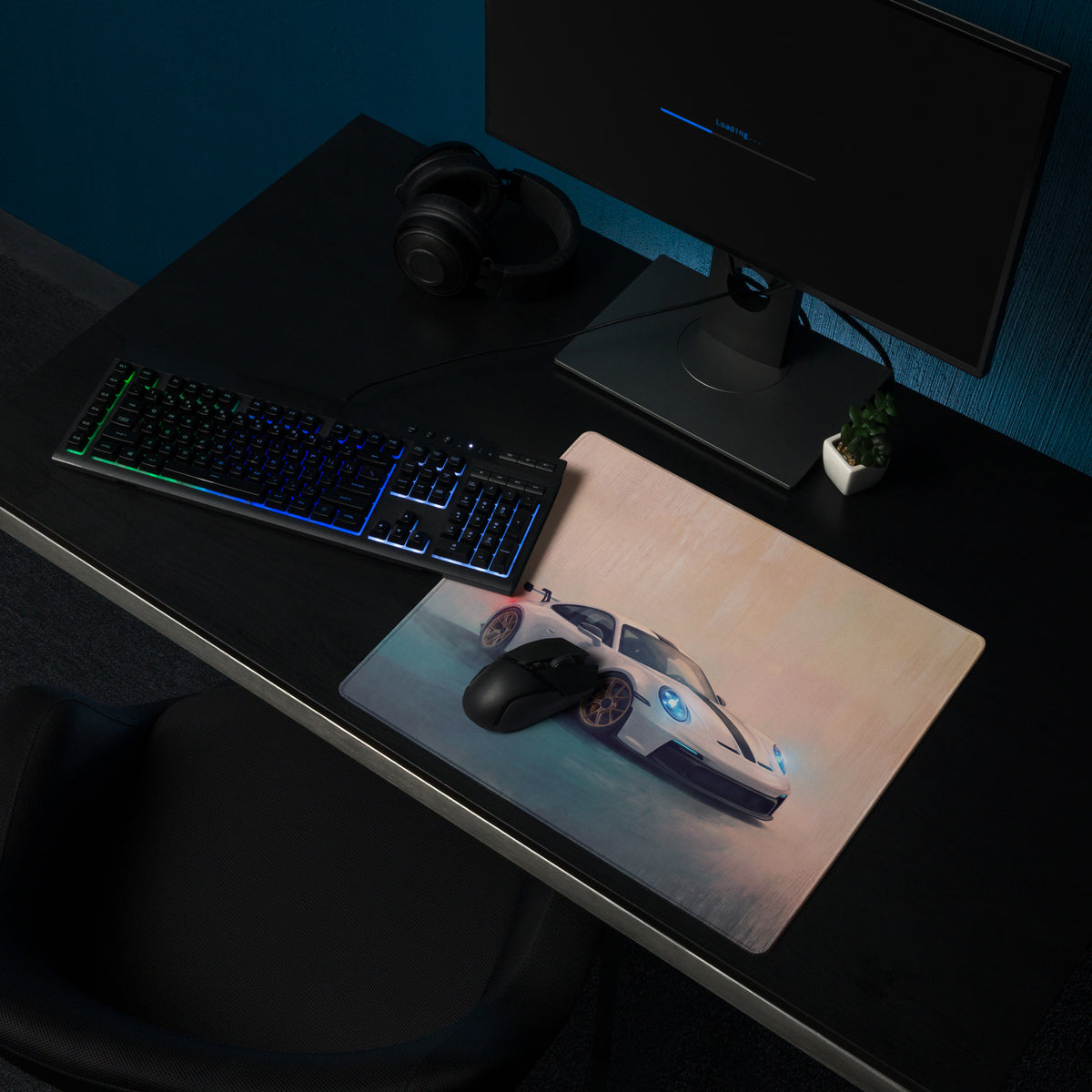 A sleek rectangular porsche 911 gt3 inspired white gold desk pad featuring a white sports car graphic with blue accents and black racing stripes on a non slip rubber base