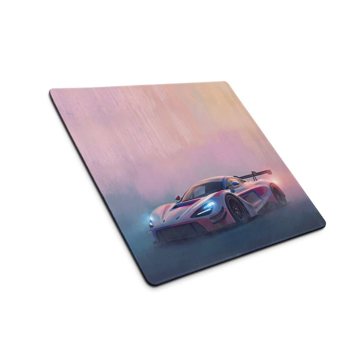 A sleek xl gaming mouse pad with premium stitched edges featuring a neon pink and white mclaren 720s gt3 design