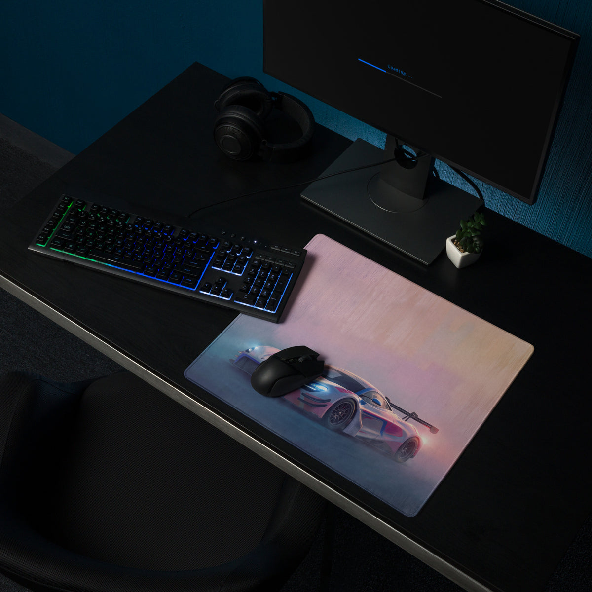 A sleek rectangular premium stitched edge xl gaming mousepad with a neon pink and white mclaren 720s gt3 graphic