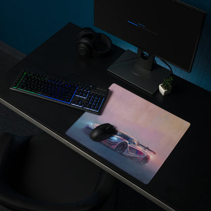 A sleek rectangular premium stitched edge xl gaming mousepad with a neon pink and white mclaren 720s gt3 graphic