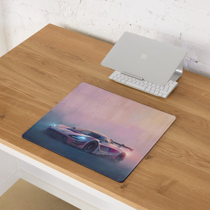 Rectangular gaming mousepad with vibrant pink and blue mclaren 720s gt3 neon track graphic on smooth glossy surface