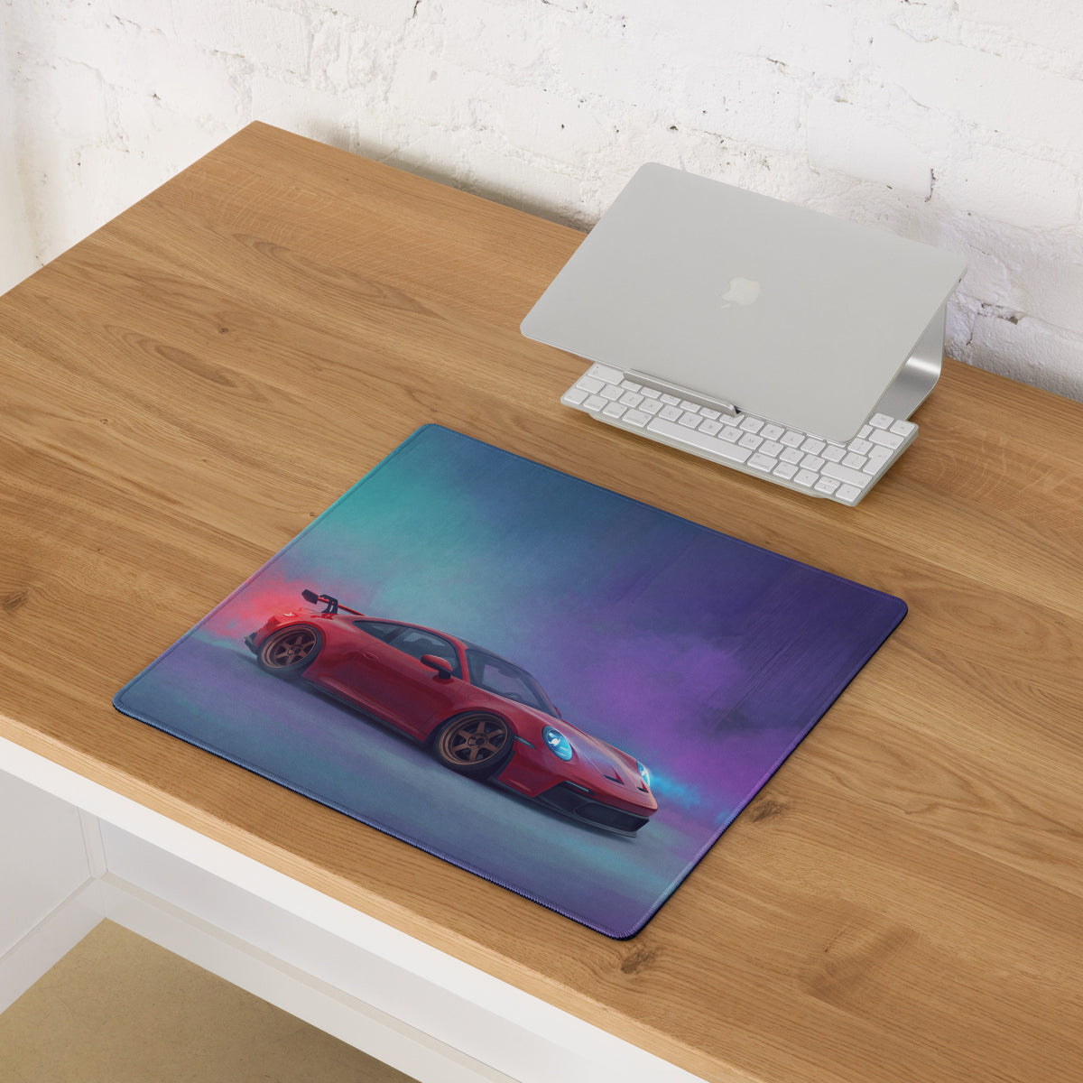 Porsche 911 gt3 rs inspired crimson drift desk pad with red sports car graphic on teal purple and blue gradient background
