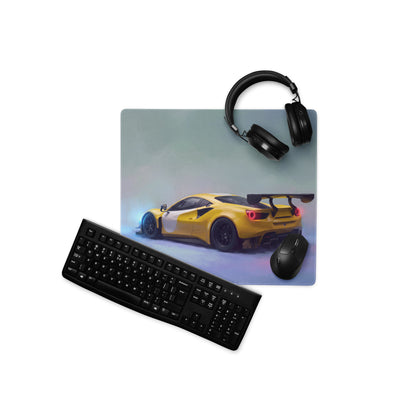Yellow and white ferrari 488 gt3 inspired modena circuit desk pad with stitched edge on gaming setup with keyboard mouse and headphones