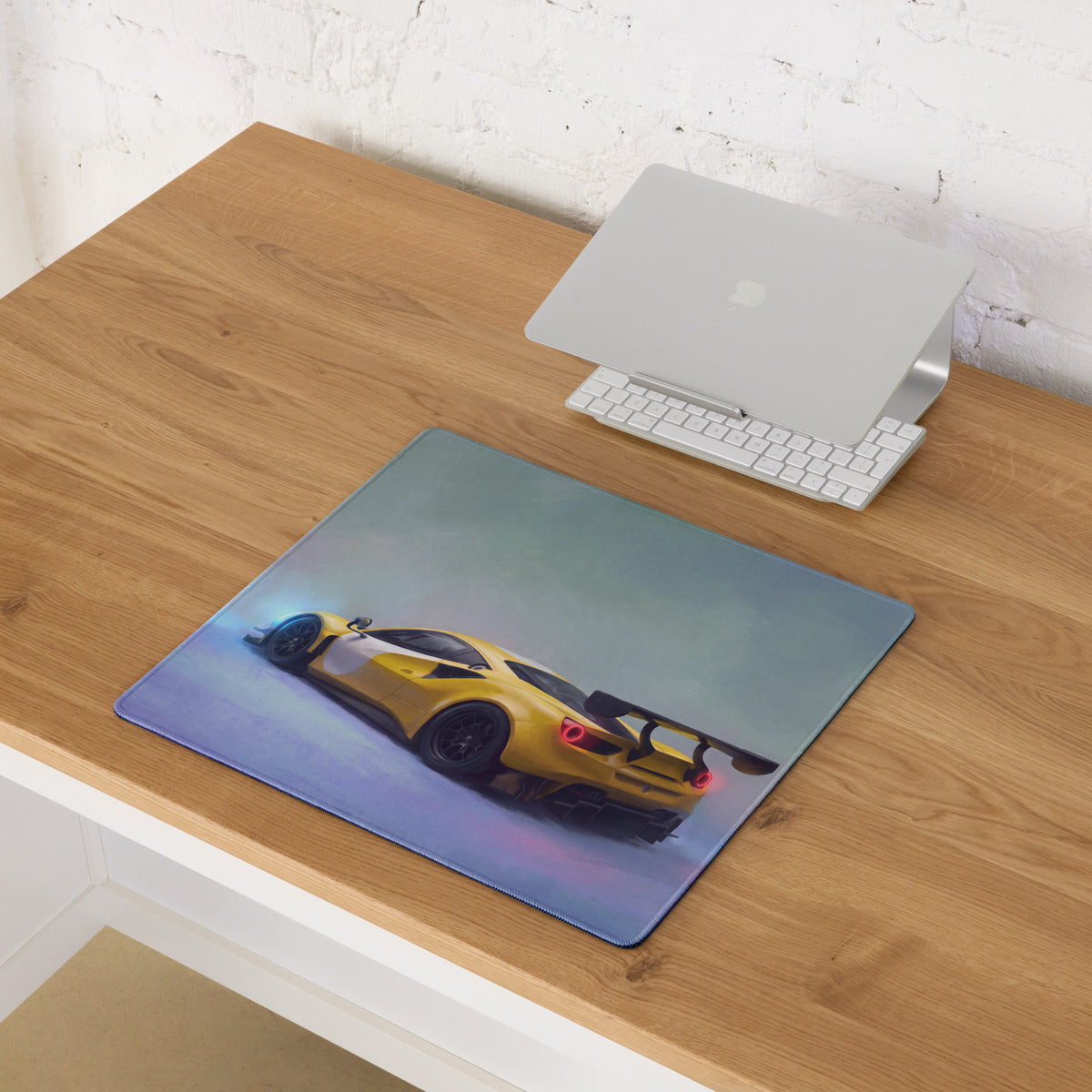 Ferrari 488 gt3 inspired modena circuit desk pad with yellow sports car graphic, glossy finish, and blue gradient background