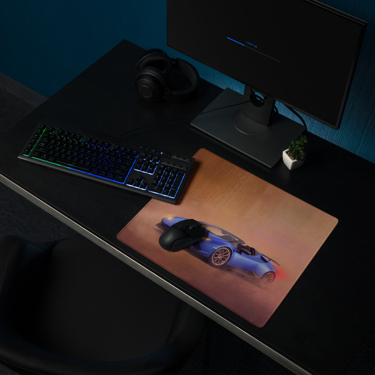 Blue sports car graphic gaming mousepad with black wireless mouse on top inspired by Lamborghini Huracán Spyder design