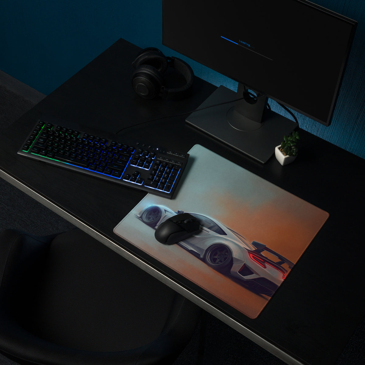 A sleek rectangular gaming mousepad with stitched edges featuring a white Acura NSX graphic on orange and gray background