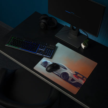 A sleek rectangular gaming mousepad with stitched edges featuring a white Acura NSX graphic on orange and gray background