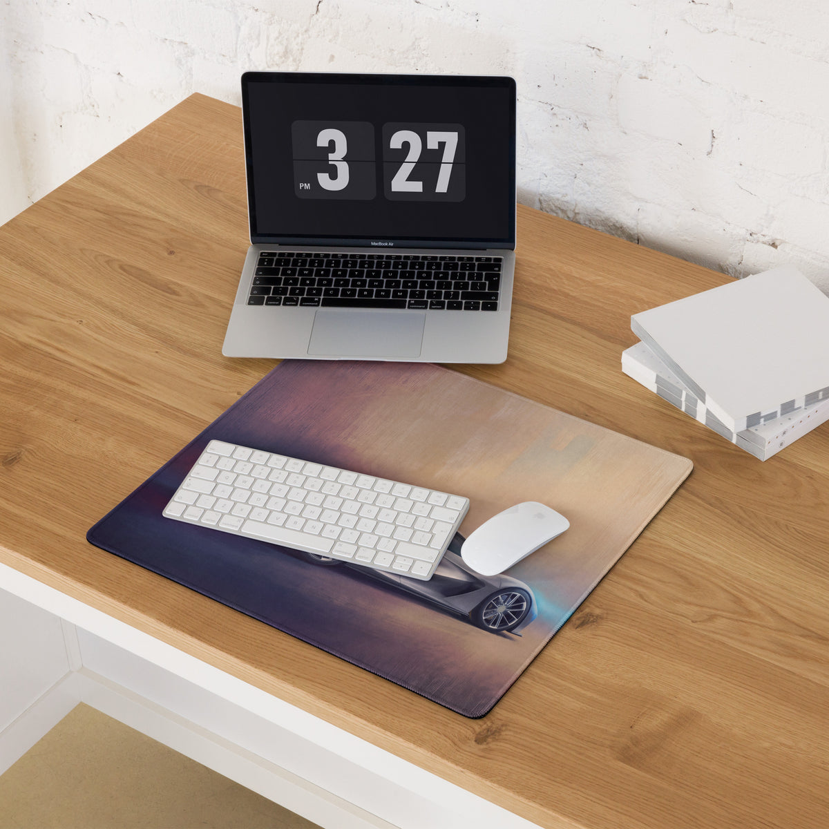 Rectangular low-friction cloth desk mat featuring a sleek black sports car on a gradient background inspired by lotus evija