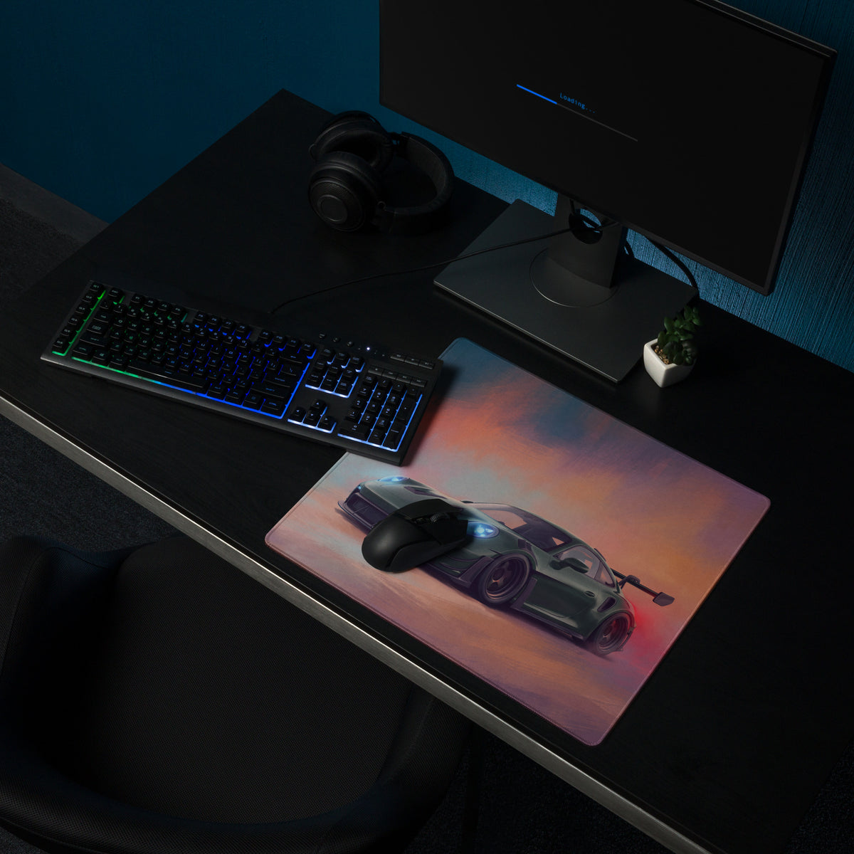 A sleek rectangular extended non slip porsche 911 gt3 rs inspired desk pad with a silver sports car graphic