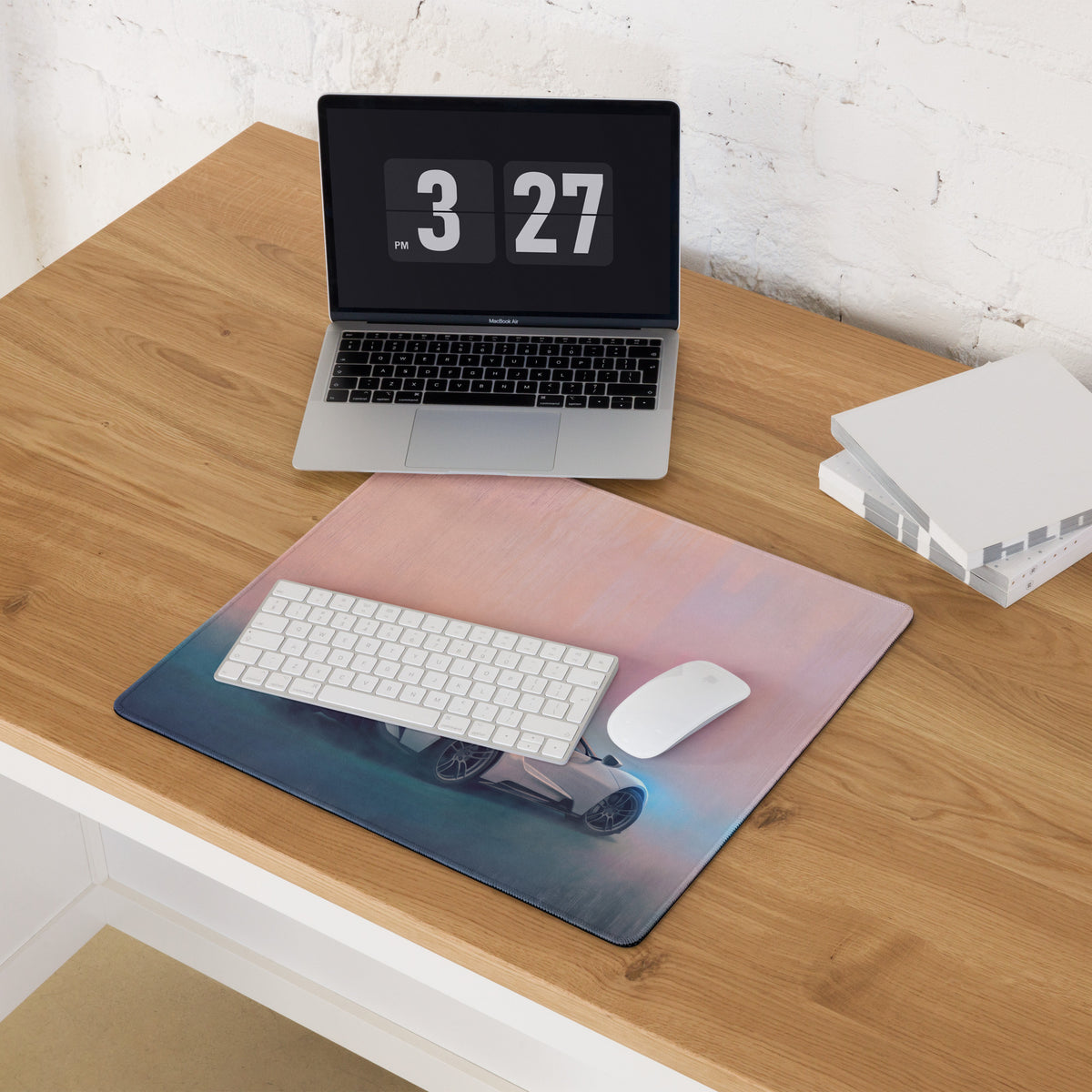 Ford GT inspired pure white desk pad with ultra glide stitched edge featuring a blue to pink gradient and silver sports car