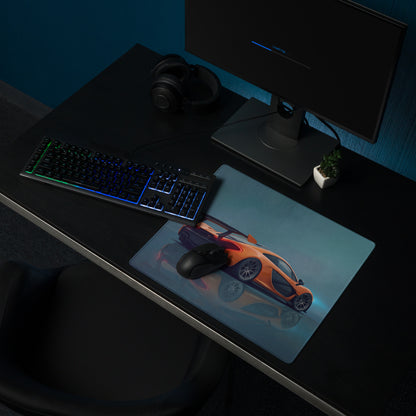 Orange mclaren sports car graphic printed on a volcano orange low-friction cloth desk mat mousepad