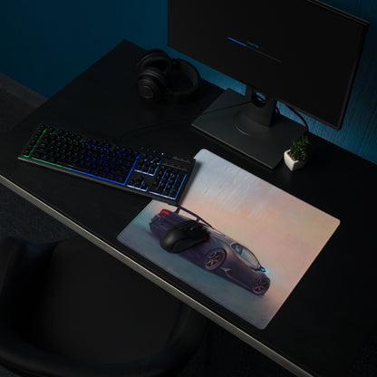A sleek rectangular xl gaming mousepad with a vibrant purple lamborghini huracán graphic and gradient sky backdrop
