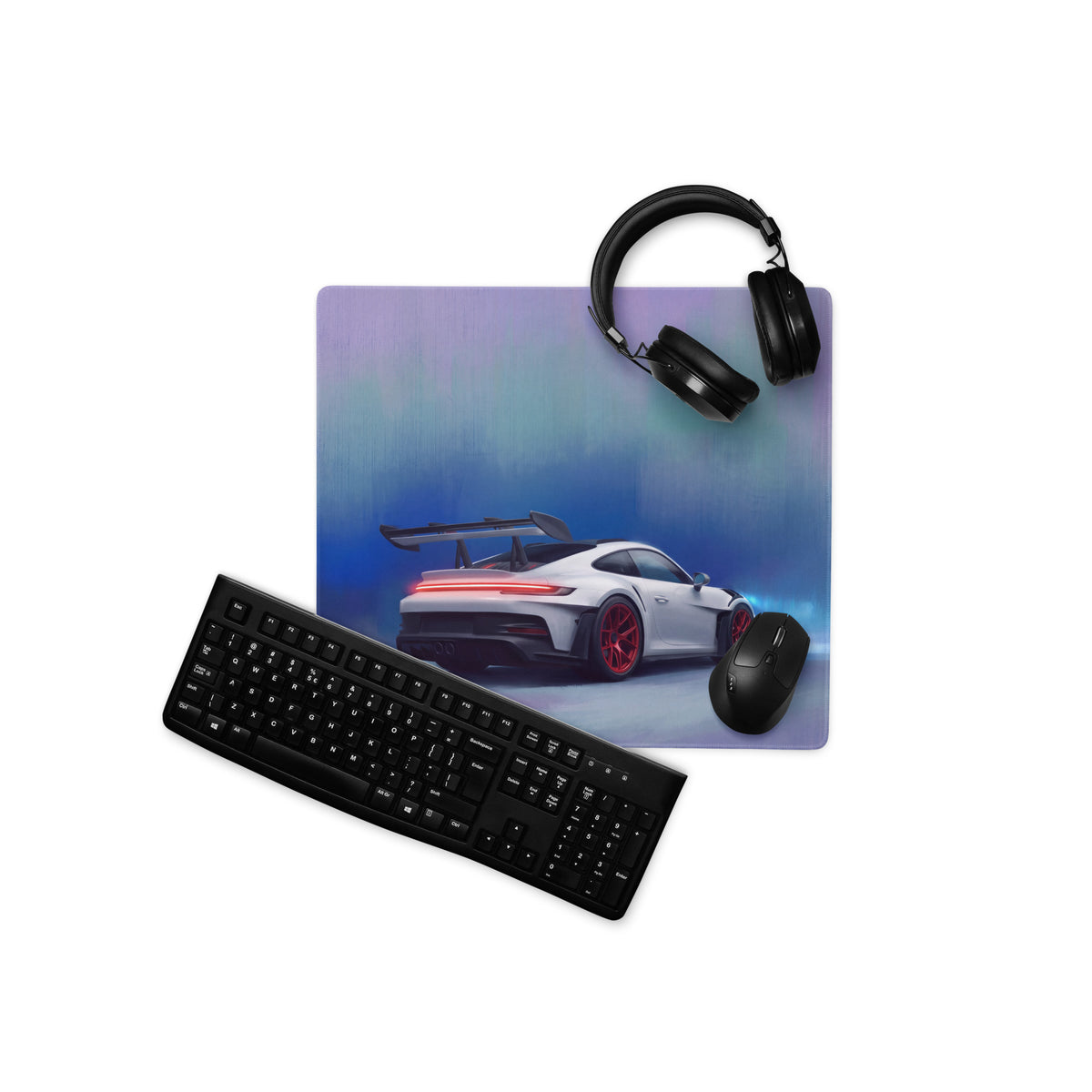 A rectangular ultra-glide stitched edge gaming mousepad with a vibrant gradient and white Porsche 911 GT3 RS red accents