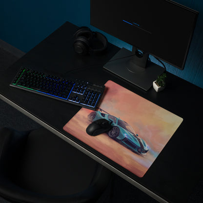 A rectangular ferrari sf90 xx inspired turquoise apex desk pad featuring a teal and black sports car on a gradient background