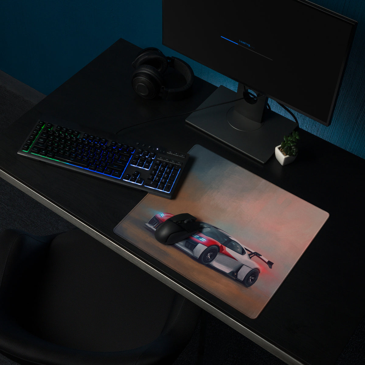 A sleek rectangular extended non slip gaming mousepad with a vibrant red and silver Porsche Mission R graphic