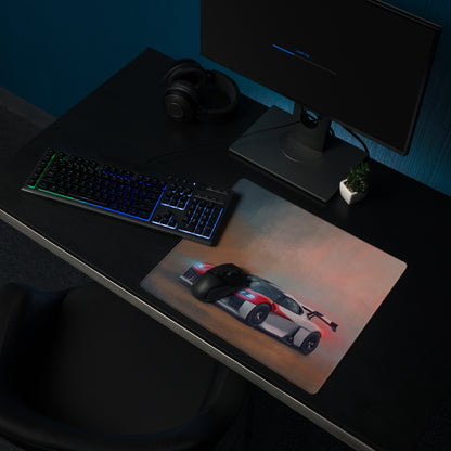 A sleek rectangular extended non slip gaming mousepad with a vibrant red and silver Porsche Mission R graphic