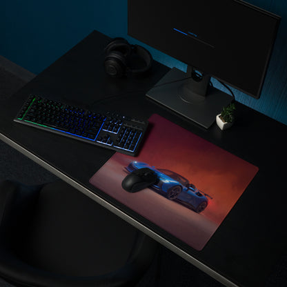 Ferrari sf90 xx inspired corsa blue desk mat featuring a blue sports car graphic on red and orange gradient background