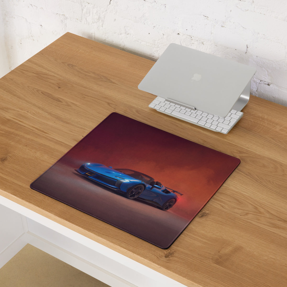 Ferrari sf90 xx inspired corsa blue desk mat with blue sports car graphic on a high precision xl gaming mousepad