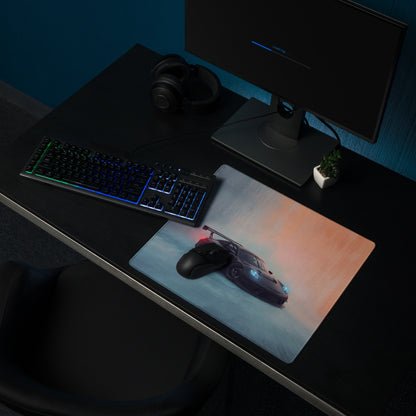 Sleek rectangular low friction cloth gaming mousepad with black porsche 911 gt3 graphic and glowing blue headlights