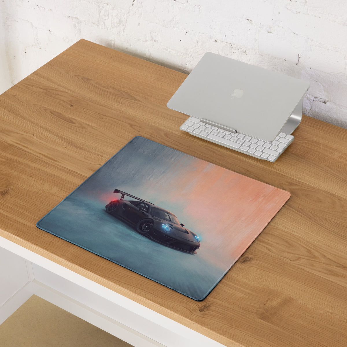Rectangular low-friction cloth Porsche 911 GT3 inspired mousepad with dark sports car and glowing blue headlights design