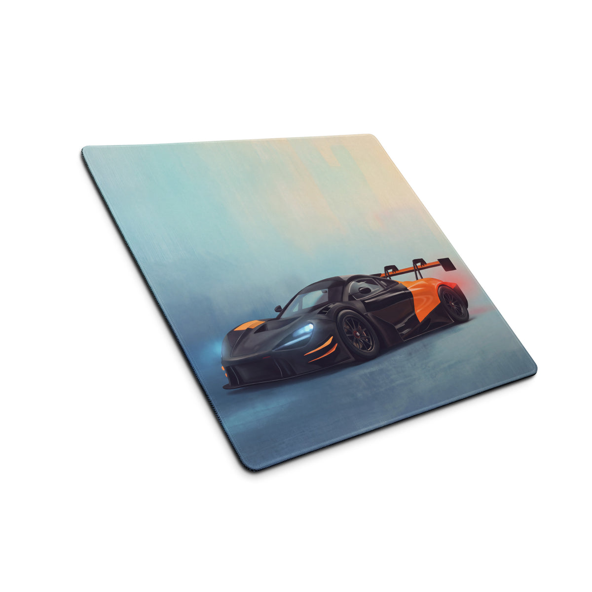 Black and orange McLaren 720S GT3 inspired low-friction cloth mousepad featuring a rectangular racing car graphic