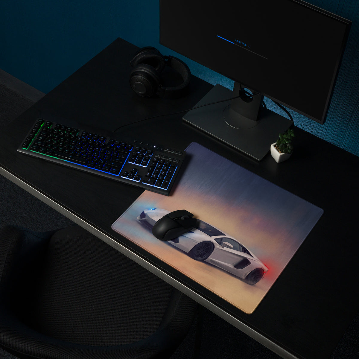 A sleek rectangular non-slip desk pad featuring a vibrant white Lamborghini Aventador graphic with red and blue accents