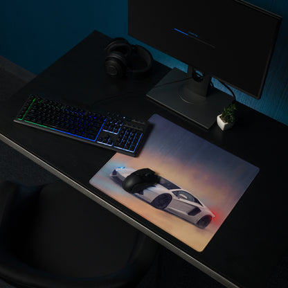A sleek rectangular non-slip desk pad featuring a vibrant white Lamborghini Aventador graphic with red and blue accents