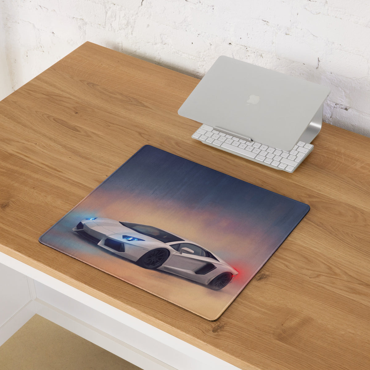 Lamborghini Aventador inspired pearl white rectangular desk pad with glowing blue and red sports car graphic and non slip base
