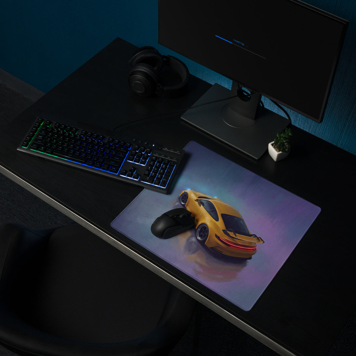 A vibrant yellow porsche 911 gt3 inspired speed desk pad with translucent material and purple blue gradient accents