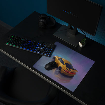 A vibrant yellow porsche 911 gt3 inspired speed desk pad with translucent material and purple blue gradient accents