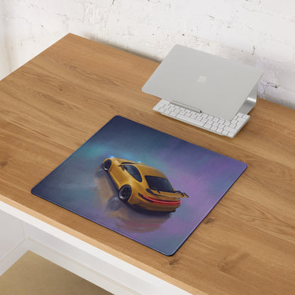 Yellow sports car graphic on porsche 911 gt3 inspired speed yellow desk pad with stitched edge and gradient background