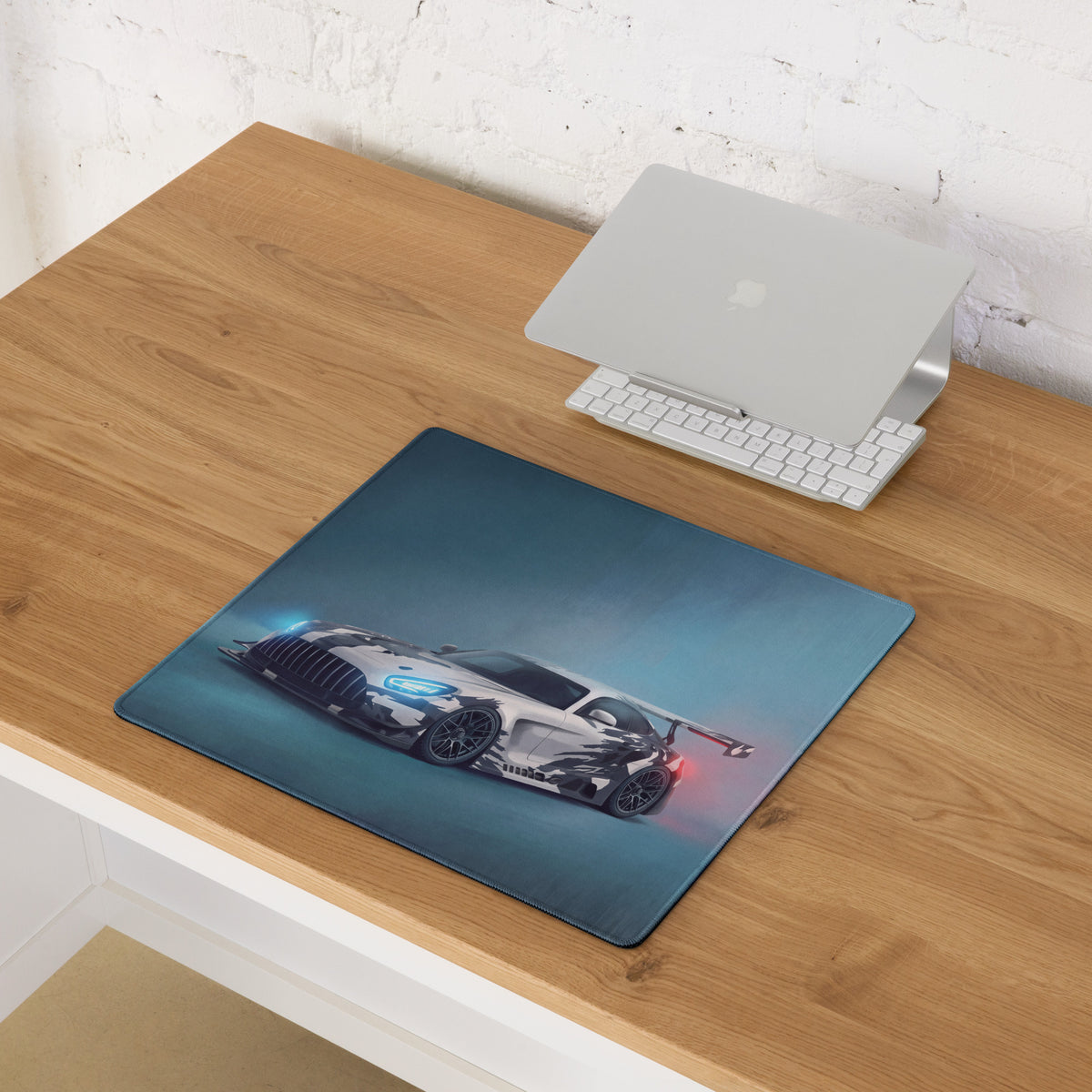Blue mercedes-AMG GT3 inspired cyber camo desk pad with sleek glossy finish and detailed racing car graphic design