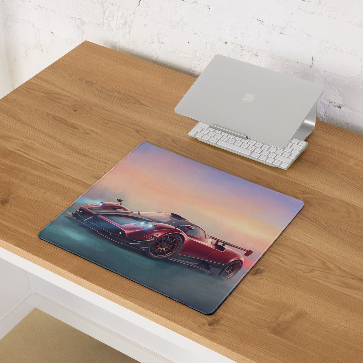 Pagani zonda inspired rosso sunset desk pad featuring a red sports car graphic on a non-slip rectangular mousepad