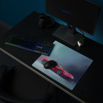 Red sports car graphic mousepad with sleek design and glossy finish on a low-friction cloth desk mat for smooth use