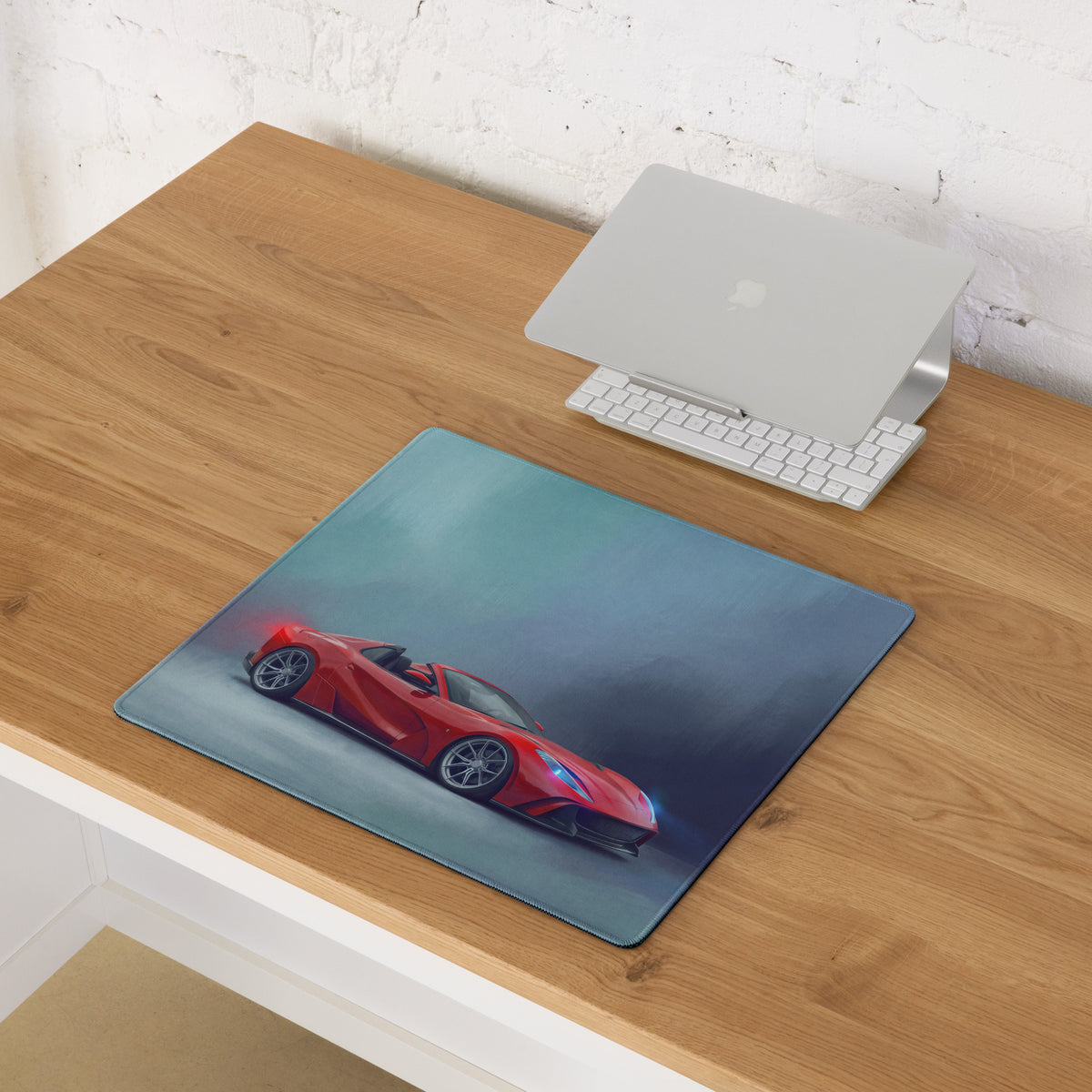 Ferrari 812 gts inspired rosso sunset desk mat featuring a red sports car graphic on a low-friction cloth mousepad
