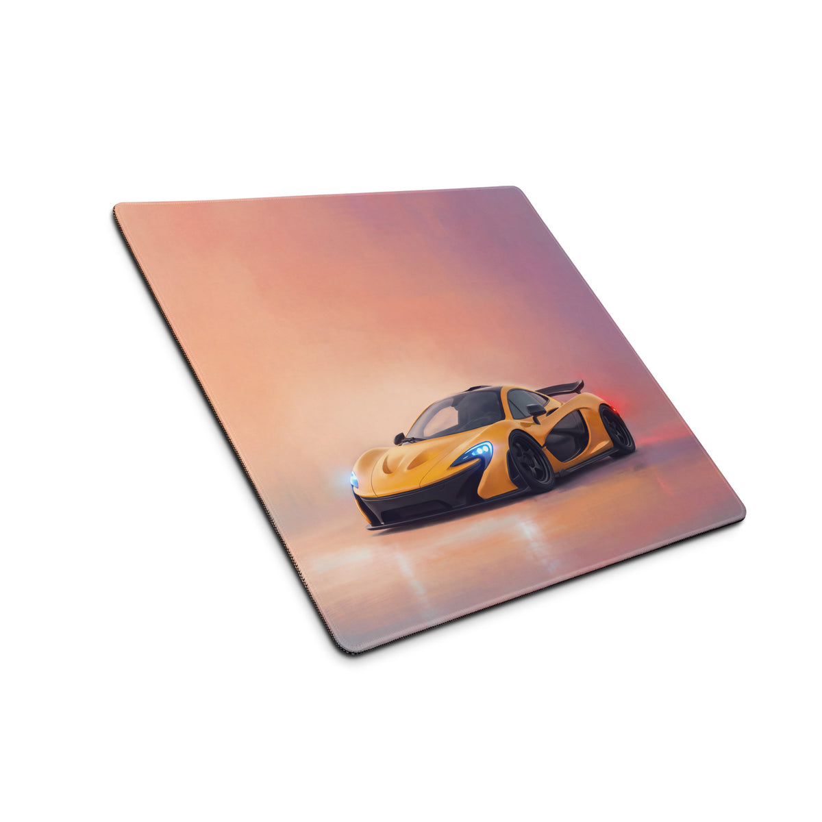 Yellow mclaren p1 graphic printed on a square low-friction cloth mousepad for smooth desk setup use