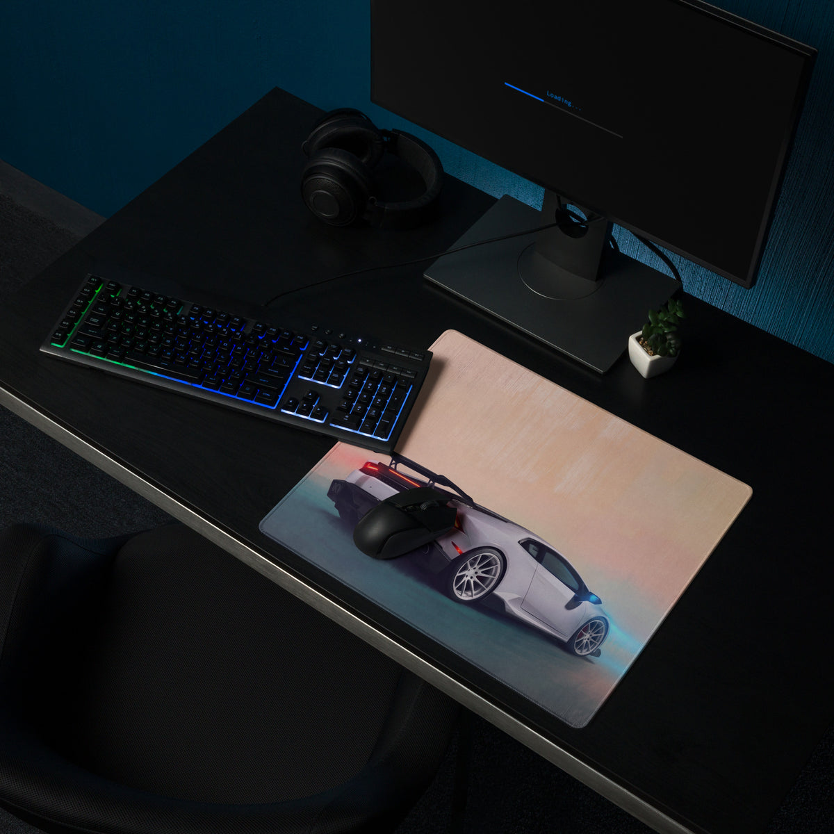 A sleek rectangular non slip gaming mousepad featuring a vibrant white and red lamborghini huracán graphic with blue lighting effects