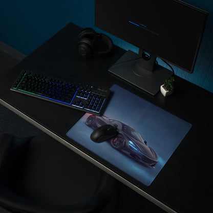 A sleek dark gray xl gaming mousepad featuring a high resolution print of a futuristic mclaren 720s sports car