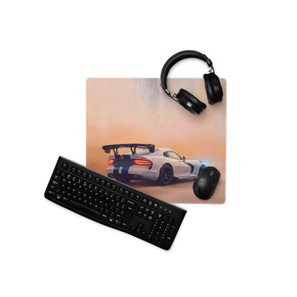 Rectangular dodge viper acr inspired gts blue stripe desk pad with glowing red taillights on orange racing track background