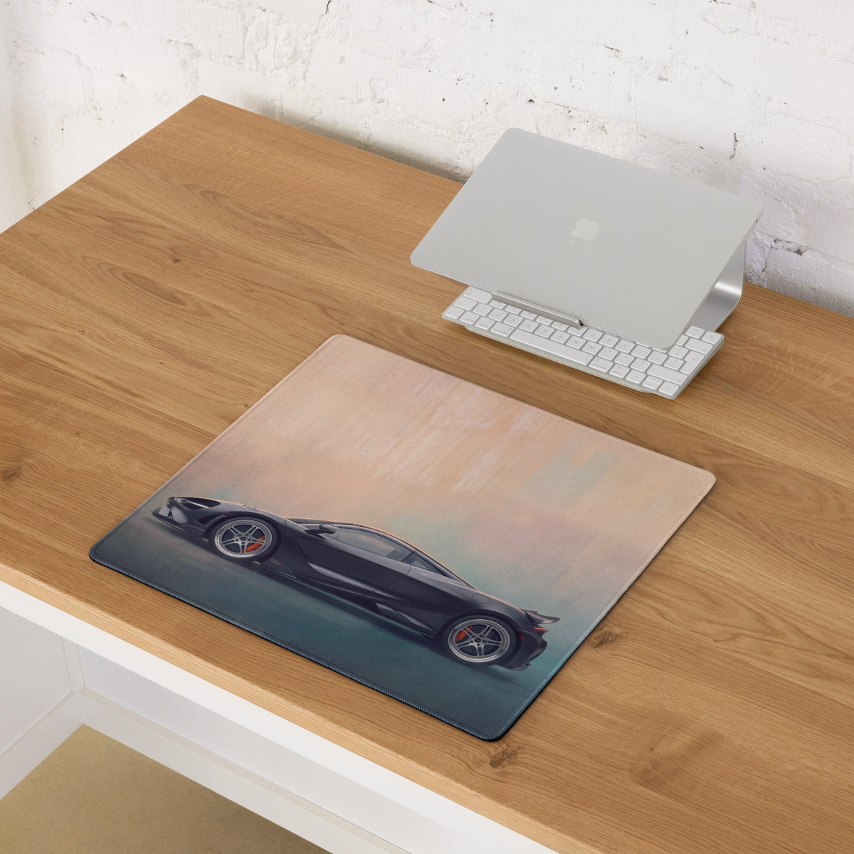 Black mclaren 765lt inspired carbon profile desk mat featuring a low-friction cloth surface with sports car graphic